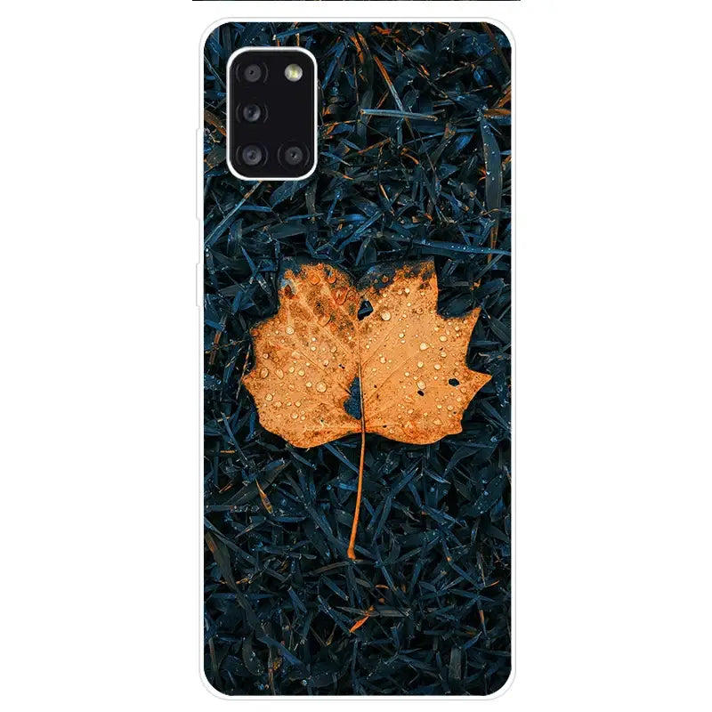a phone case with a leaf on it