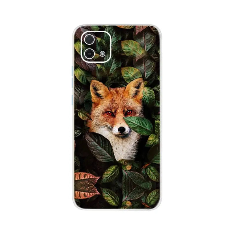 a phone case with a fox in the leaves