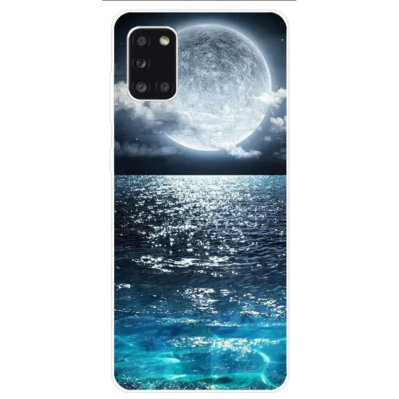 a phone case with a full moon over the ocean