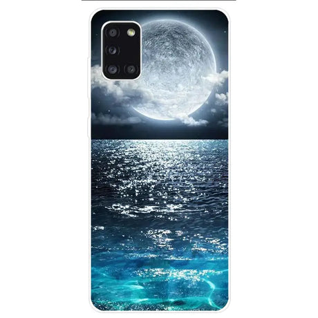 A phone case with a full moon over the ocean