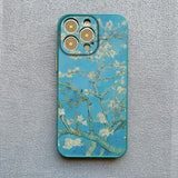 a phone case with a painting of a blossom tree