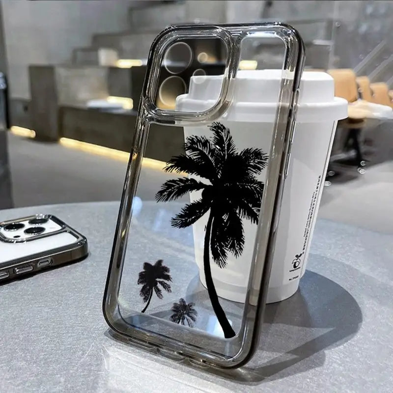 a phone case with a palm tree on it