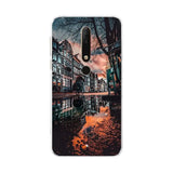 a phone case with a photo of a canal in amsterdam