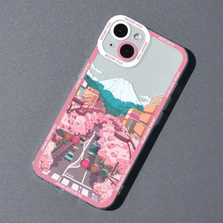 A phone case with a pink background and a picture of a city