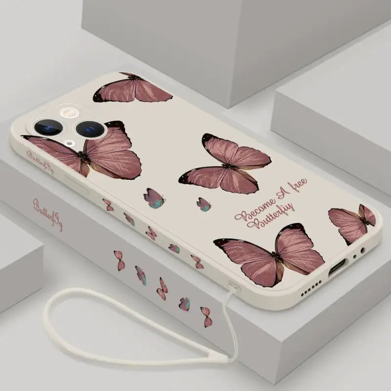a phone case with pink butterflies on it