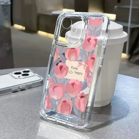 A phone case with a pink flower design on it