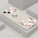 a phone case with pink flowers and butterflies