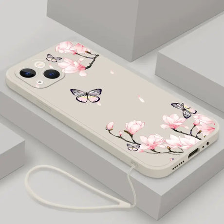 A phone case with pink flowers and butterflies