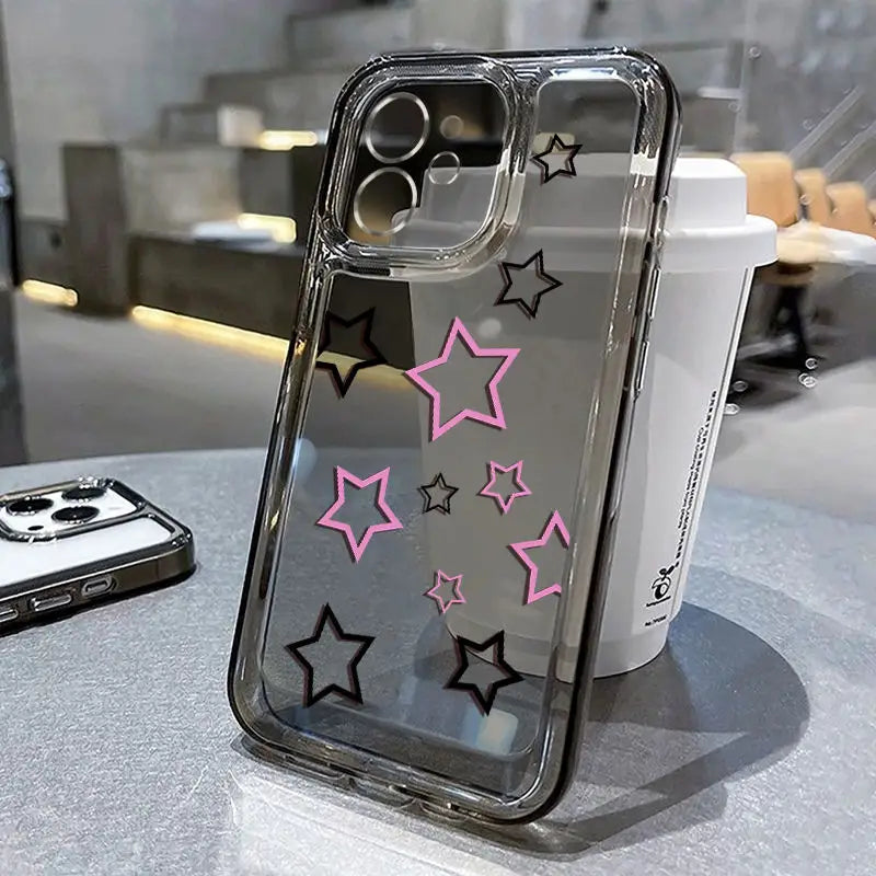 a phone case with pink stars on it