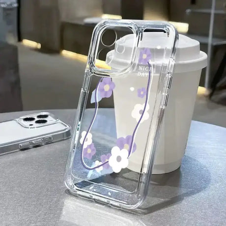 A phone case with a purple flower design on it