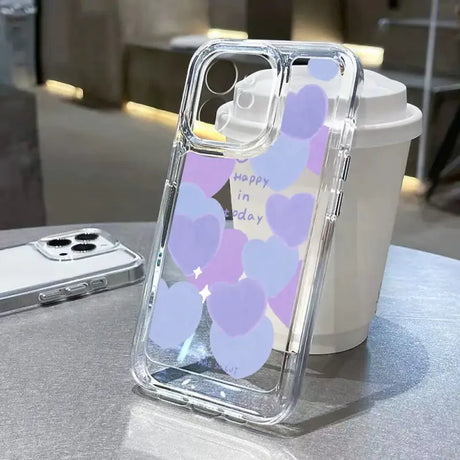 A phone case with a purple and white design