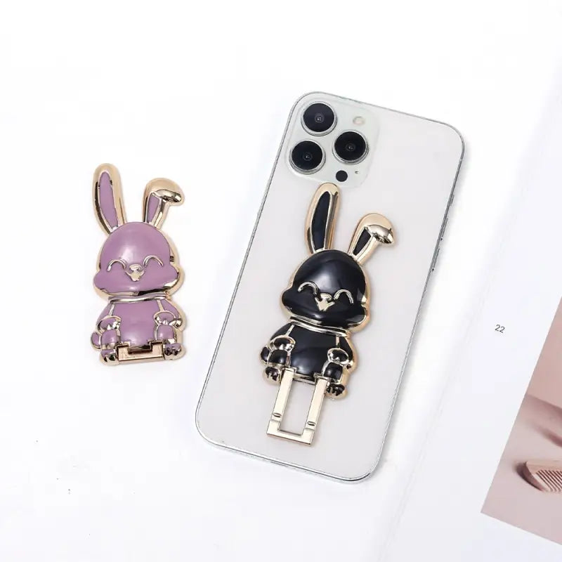 a phone case with a rabbit and a key