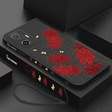a phone case with red flowers on it