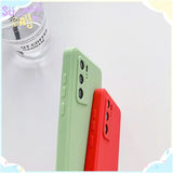 a phone case with a red and green cover