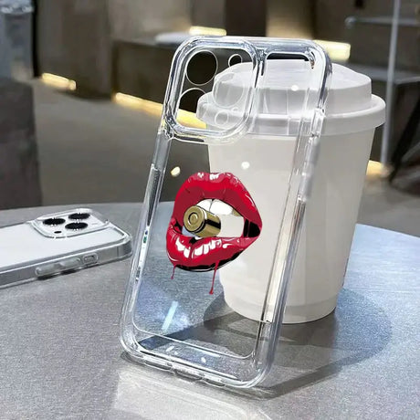 A phone case with a red lip on it