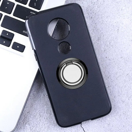 a phone case with a ring on it