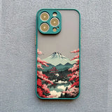 a phone case with a mountain scene on it