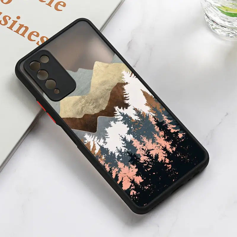 a phone case with a mountain scene on it