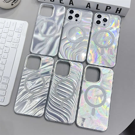 a phone case with a silver swirl design