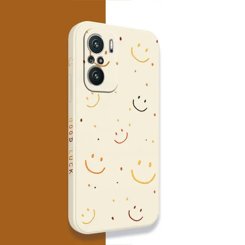 a phone case with a smiley face on it