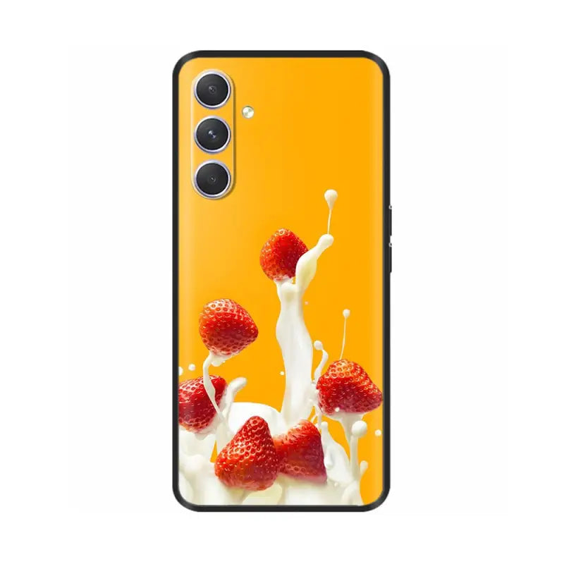 a splash of milk and strawberries on an orange background phone case