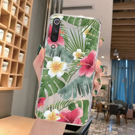 A phone case with a tropical print