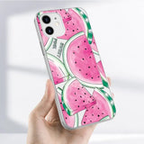 someone holding a phone case with a watermelon design on it