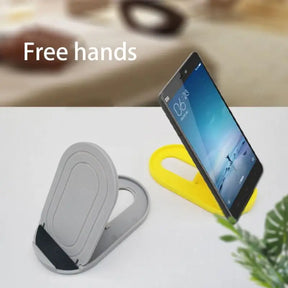 a phone and a cup on a table