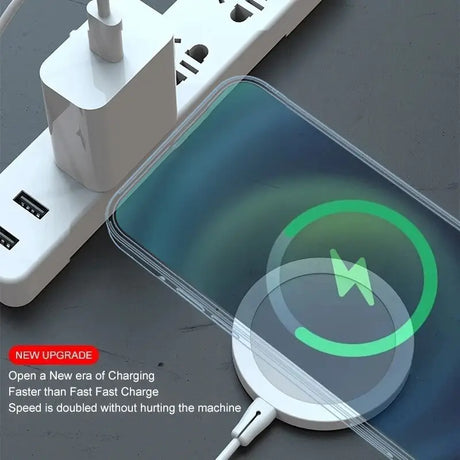 an iphone charging station with a green circle on it