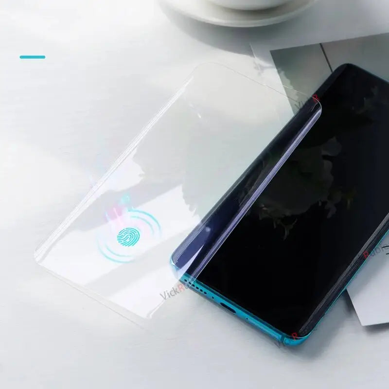 a phone with a glass screen on top of it