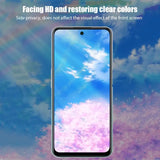 a phone with the sky and clouds in the background