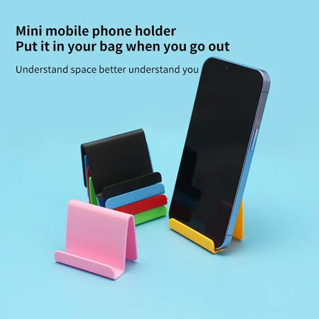 a phone and a cell stand on a blue background