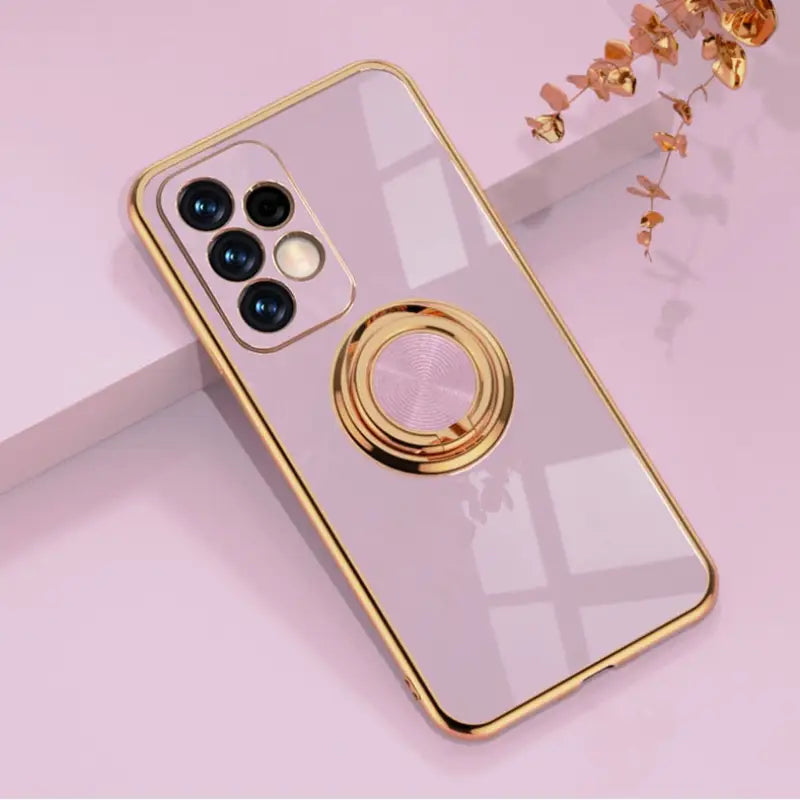 a phone with a gold ring on it