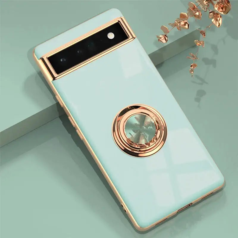 a phone with a gold ring on it