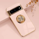 a phone with a gold ring on it