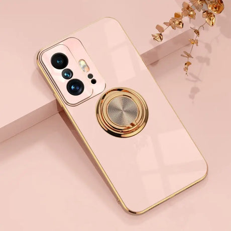 a phone with a gold ring on it