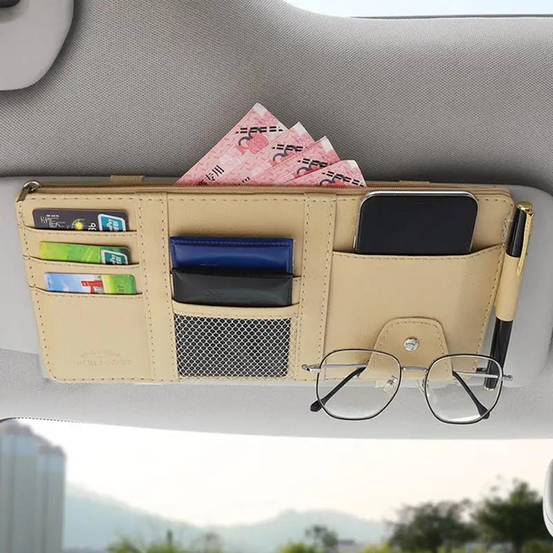 a car dashboard with a wallet and glasses