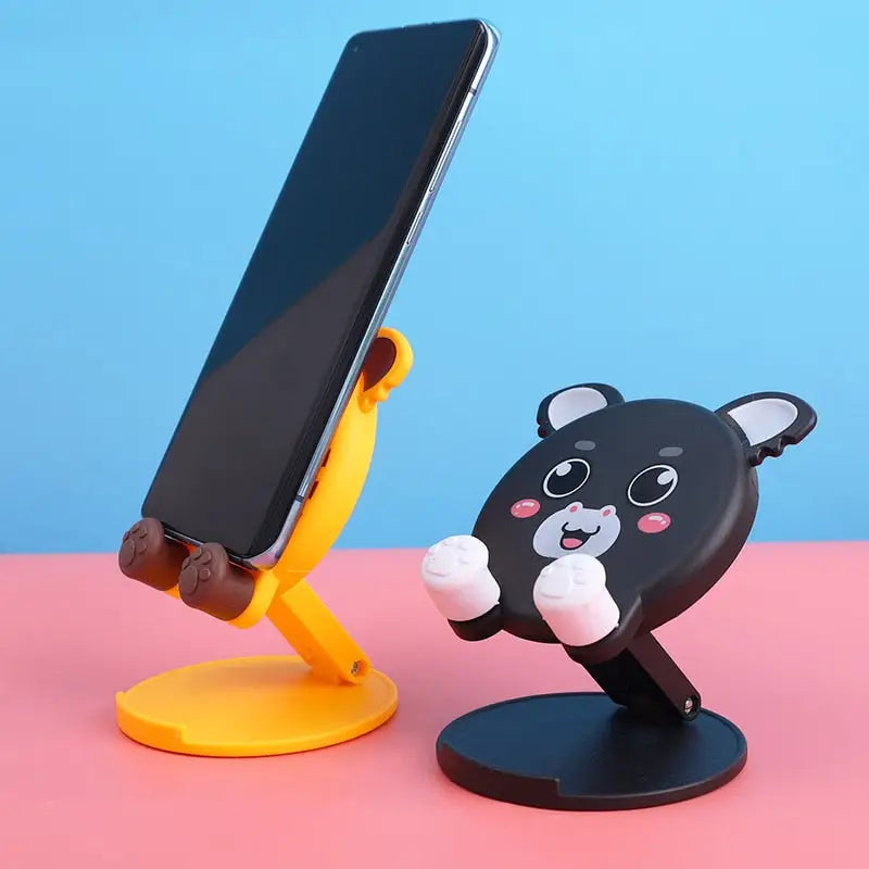 a phone holder with a cat on it