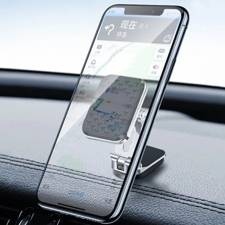 the car phone holder is attached to the dashboard