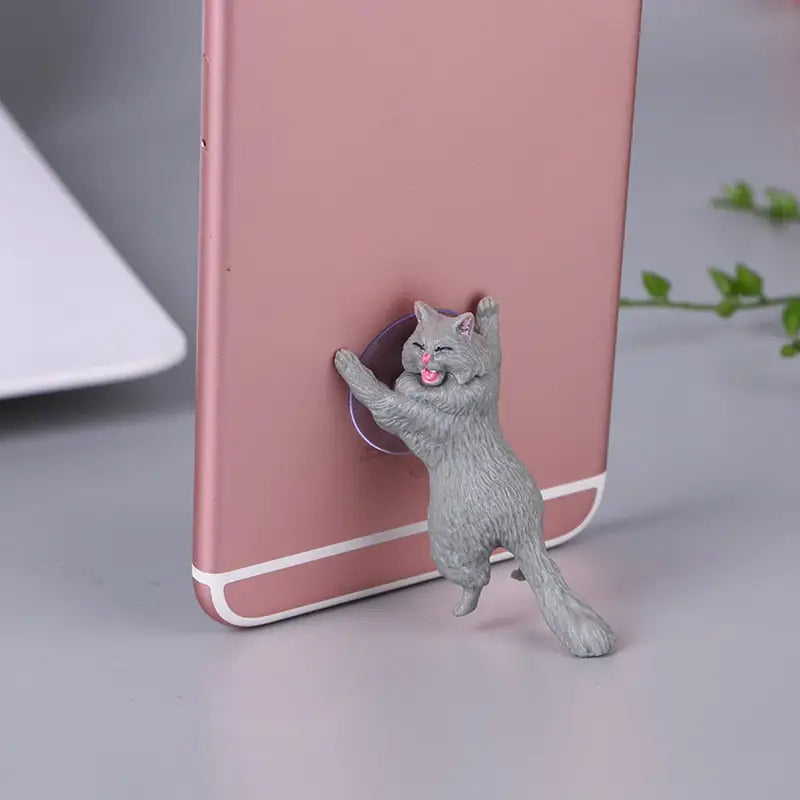 a cat phone holder with a cat on it