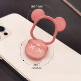 a phone with a pink earphone attached to it