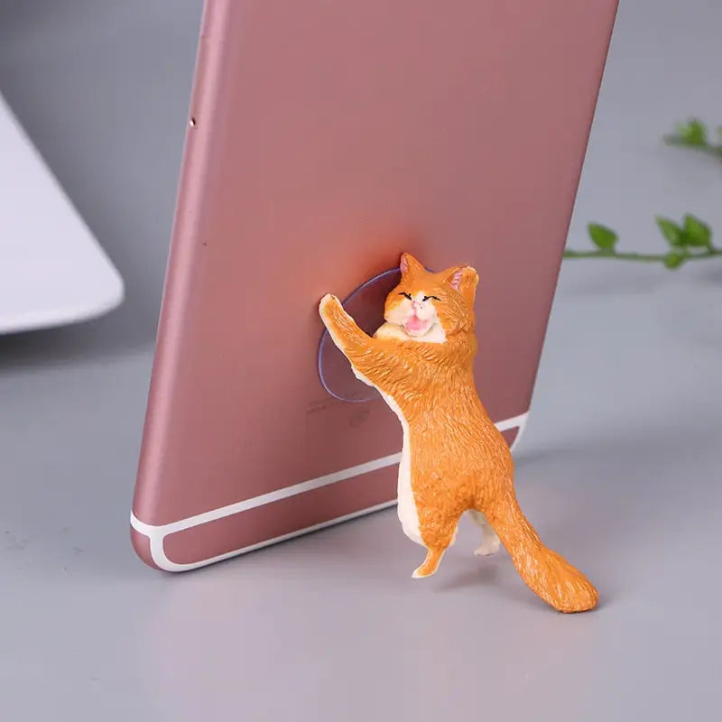 a cat phone holder with a cat on it