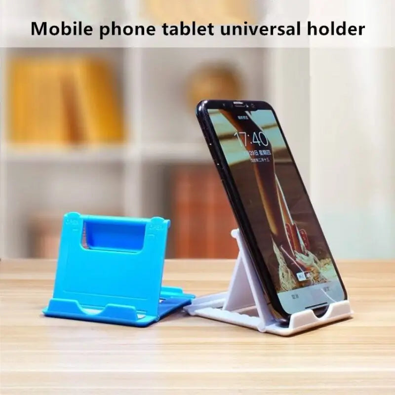 a phone holder on a table with a cell