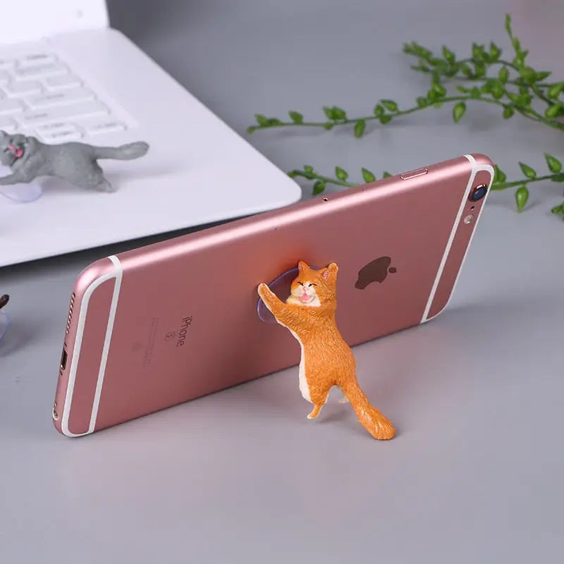 a cat phone holder with a cat on it