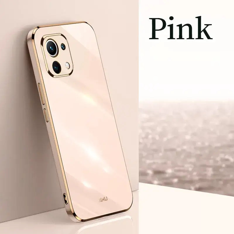 a phone with a pink logo on it