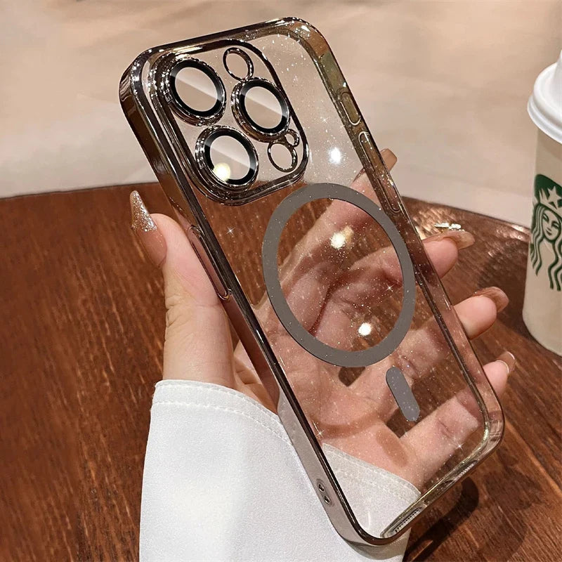 someone holding a phone with a ring on it in a starbucks cup