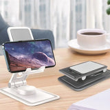the wireless phone stand is on a table