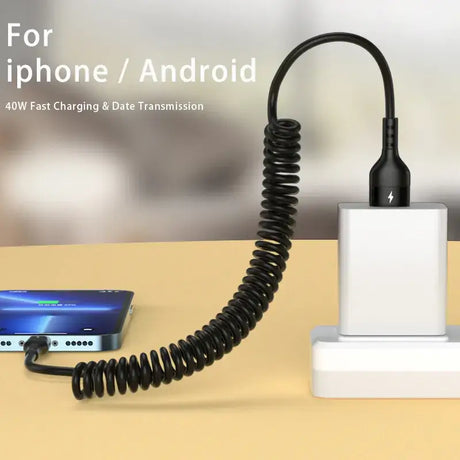 A phone charging station with a phone and a charger