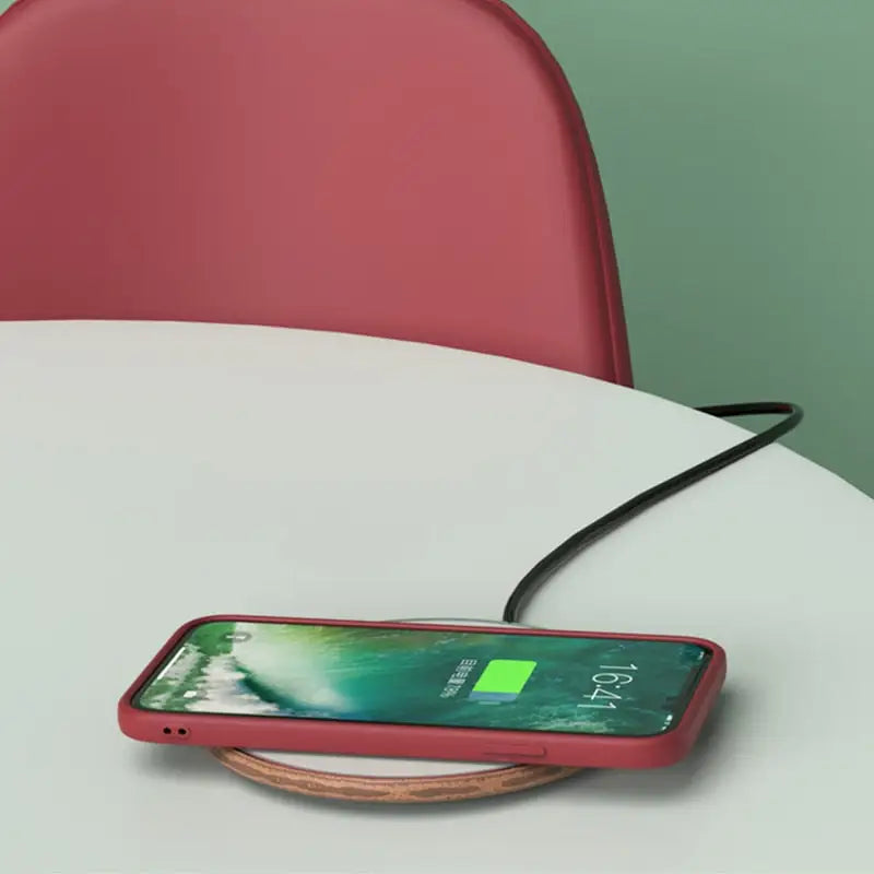 a phone charging on a table