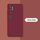 a red phone with the text wine red on it